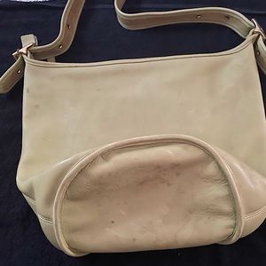 The lime green bag it’s a bucket bag.